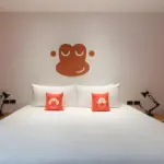 Guest room with a double bed at Blu Monkey Hub & Hotel Bangsaen